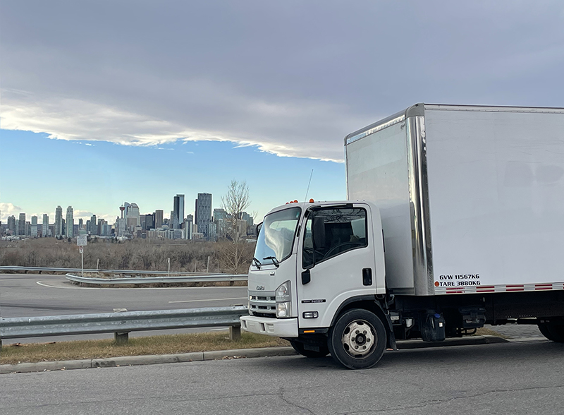 Numidia Movers moving truck outside of downtown Calgary